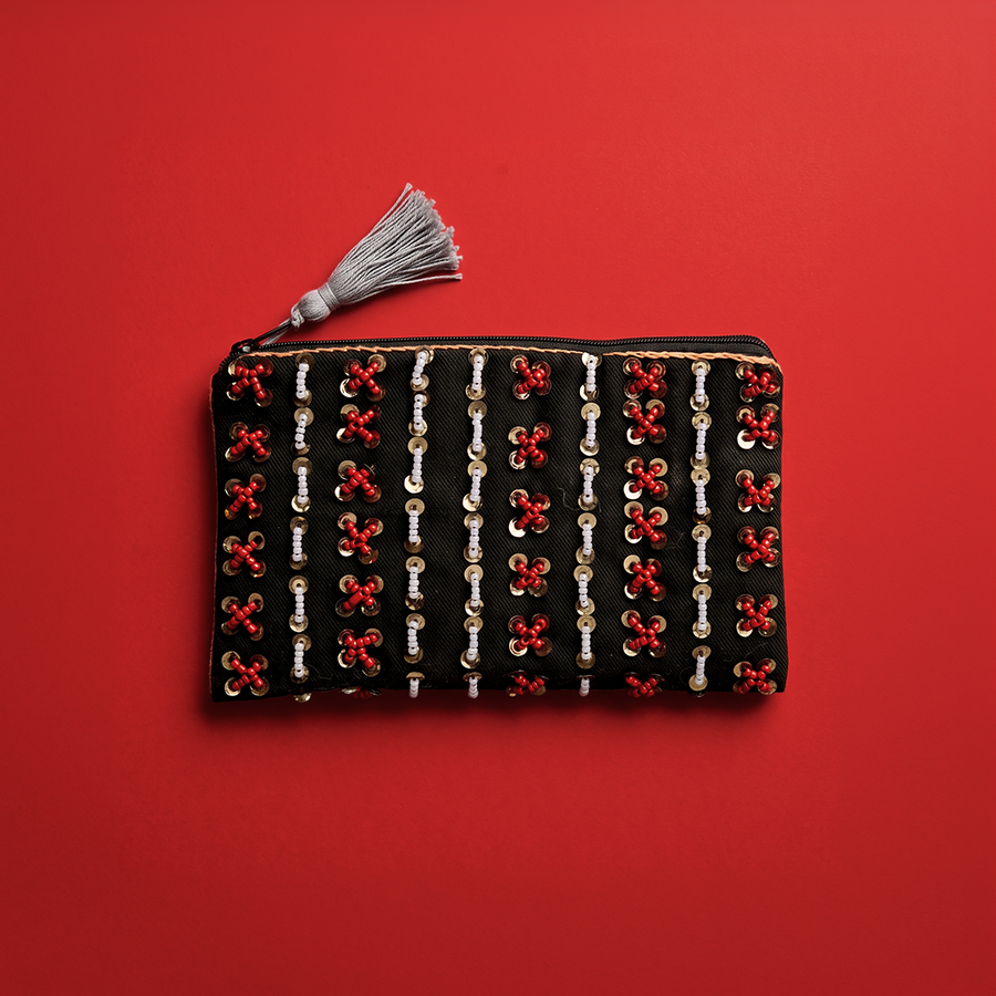 Hand-Embroidered Pouch by Rodayna
