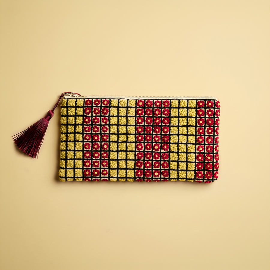Hand-Embroidered Pouch by Yousra
